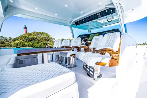 HCB 65 Estrella helm deck with quilted white helm seats under the hardtop