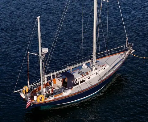 Elevated view of a Hinckley Bermuda 40 yawl showing its teak decks, cockpit and mizzen mast