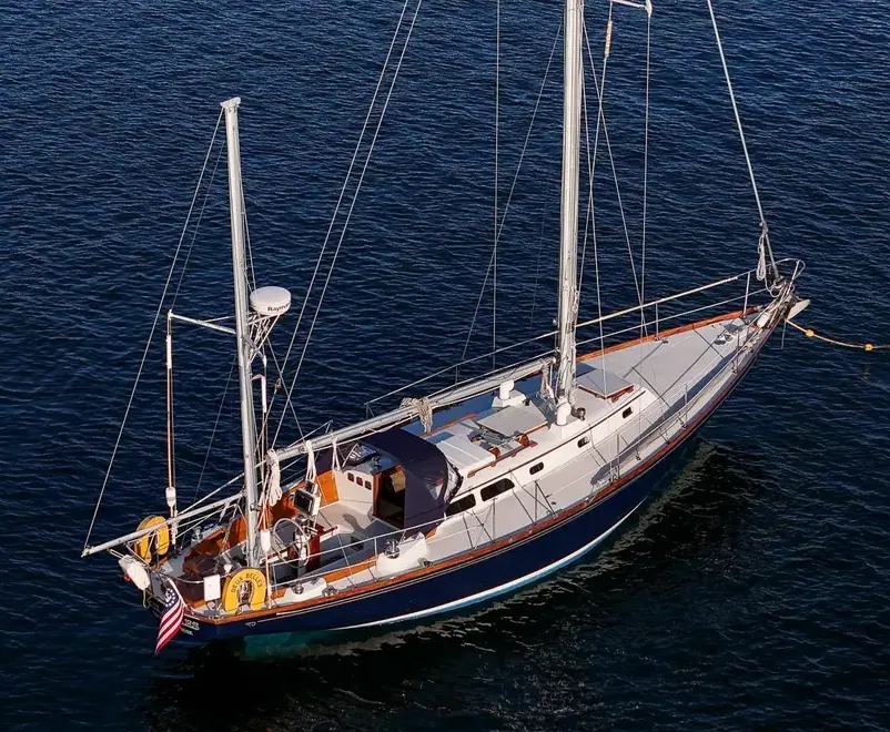Elevated view of a Hinckley Bermuda 40 yawl showing its teak decks, cockpit and mizzen mast