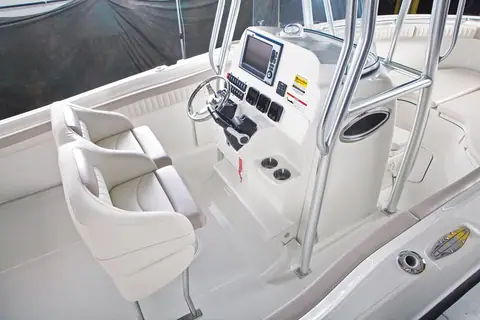 Hydra Sports 2500 CC helm console with wheel, electronics and leaning post seat