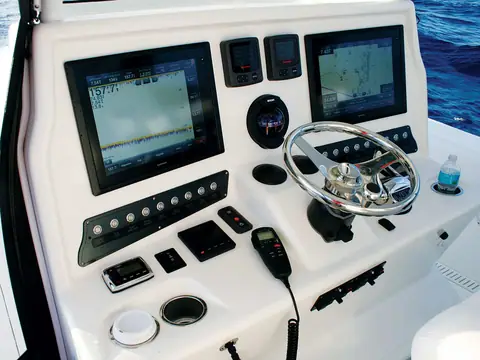 Insetta 45 helm console with twin displays, gauges and a stainless wheel