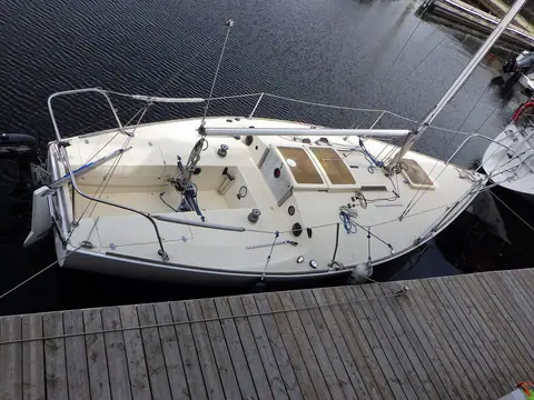 J/24 tied up at a dock seen from above