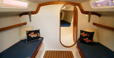 J/100 cabin with twin settee berths, teak sole and the forward hatch