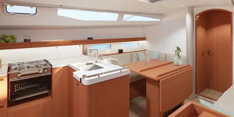Rendering of the J/40 saloon with L shaped galley, dinette table and forward cabin door