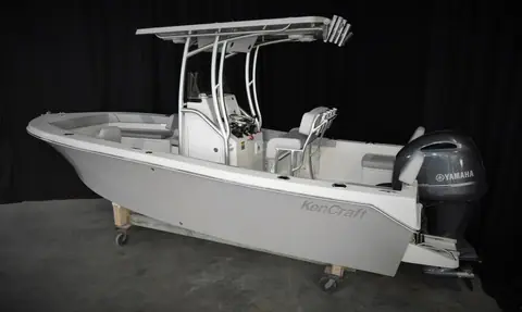 KenCraft 21 on a stand in the studio with KenCraft hull lettering, console and T top