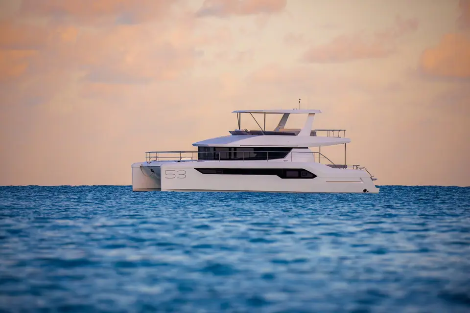 Leopard 53 Powercat in profile on open water showing its flybridge and hardtop