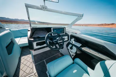 MB Sports B52 23 Alpha helm with digital dash, steering wheel and aqua upholstery