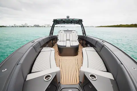 Midnight Express 37 Open bow seating looking aft to the console and T top