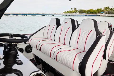 Midnight Express 37 Open helm with bolster seating and a sport steering wheel