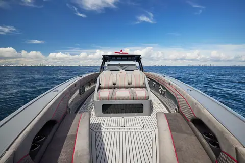 Midnight Express 52 Vitesse foredeck lounges looking aft to the hardtop
