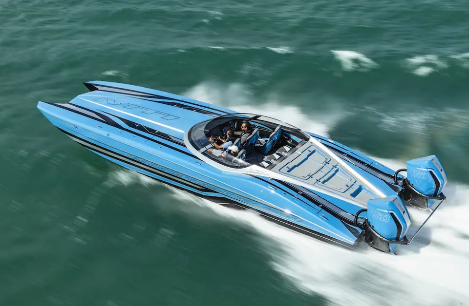 Light blue MTI 390X catamaran seen from above, showing the open cockpit and twin outboards