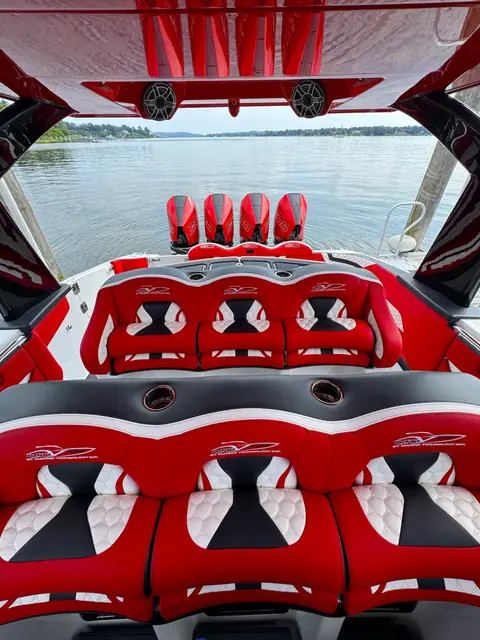MTI V 42 cockpit with two rows of bolster seats facing the quad outboards