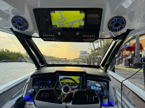 MTI V 42 helm with a sport wheel, dash displays and a T top mounted screen