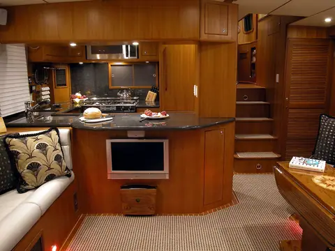 Nordhavn 47 salon looking forward to the galley and pilothouse stairs