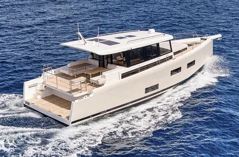 Omikron OT60 running seen from above the stern quarter with its open aft deck