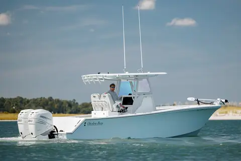 Onslow Bay 27 Offshore Edition cruising past a marsh seen from the starboard side