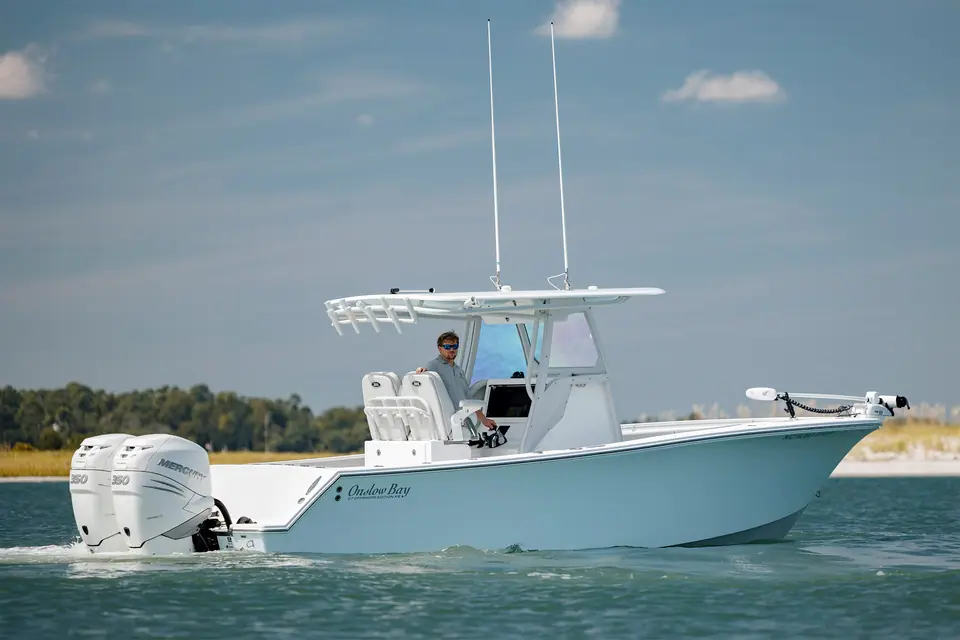 Onslow Bay 27 Offshore Edition cruising past a marsh seen from the starboard side