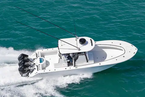 Onslow Bay 33 Tournament Edition aerial view running with outriggers and T top