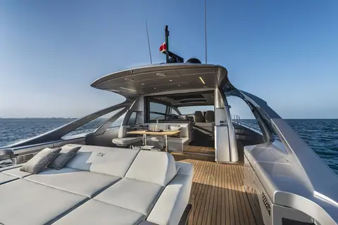 Pershing 7X aft cockpit sunpad and lounge under the hardtop