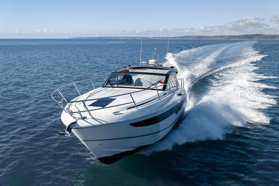 Princess V40 seen from the bow quarter carving a turn at speed