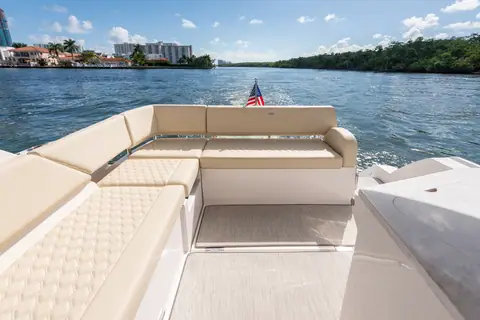 Regal 38 XO aft cockpit with wraparound quilted seating looking astern