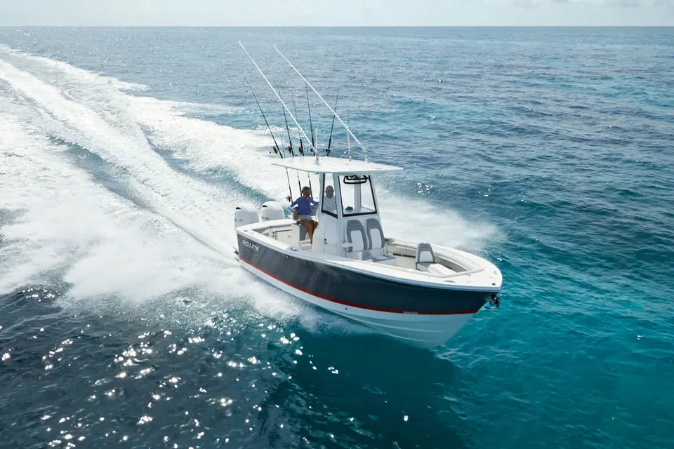 Regulator 23 seen from above running through turquoise water with a full fishing rig