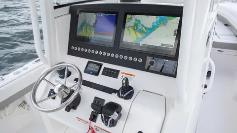 Regulator 28 console with twin Garmin displays, stainless wheel and Yamaha controls