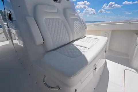 Regulator 31 forward console lounge seat with diamond quilted cushions
