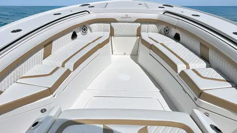 Regulator 35 bow with wraparound quilted lounge seating and a filler cushion area