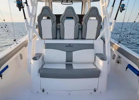 Regulator 37 helm seats and quilted aft facing lounge on the leaning post