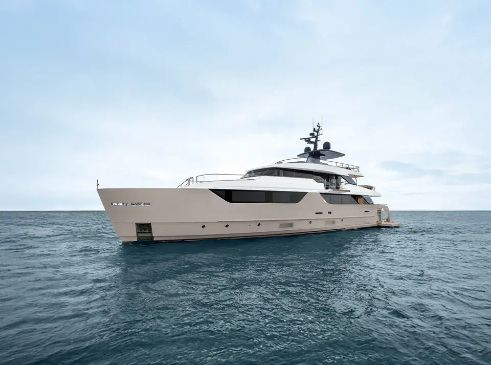 Sanlorenzo SD118 seen from the bow quarter showing its vertical stem and three decks
