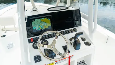 Helm of the Sea Hunt Ultra 229 with a multifunction display