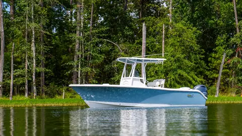 Sea Hunt Ultra 234 center console at rest in profile