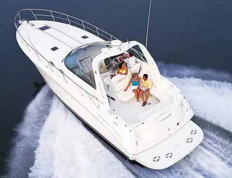 Aerial view of a Sea Ray 380 Sundancer under way with guests in the cockpit