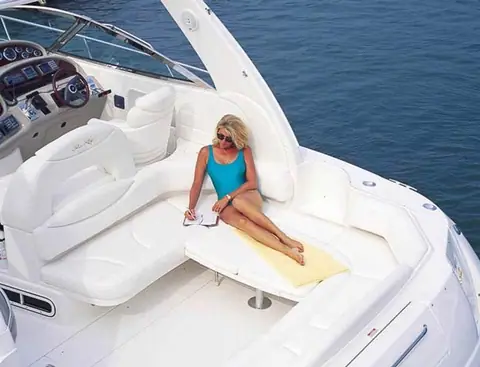 Sea Ray 380 Sundancer cockpit lounge beside the helm seat