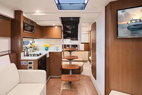 Cabin galley and dinette of the Sea Ray Sundancer 350 Coupe