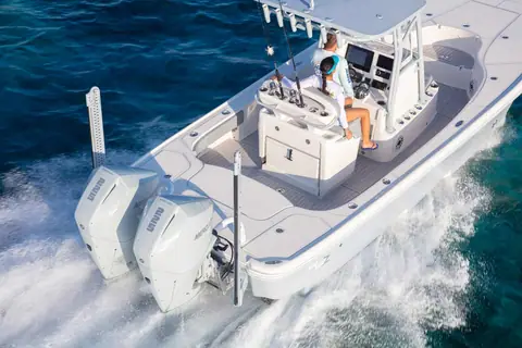 SeaVee 270Z from astern showing twin outboards, shallow water anchors and the leaning post