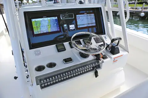 SeaVee 390Z console helm with twin multifunction displays, wheel and digital switching
