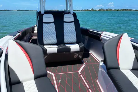 Statement 350 Open bow seating and quilted helm chairs with red trim