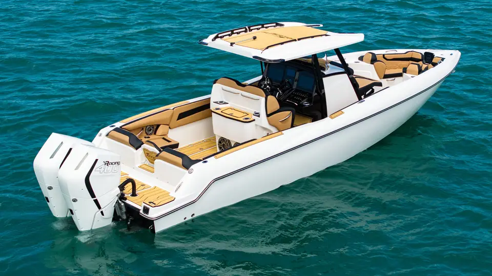 Sunsation 32 CCX with a white hull and tan upholstery seen from above at rest