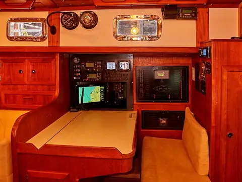 Valiant 40 navigation station with teak joinery, instruments and chart table