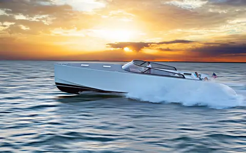 VanDutch 40 running at sunset