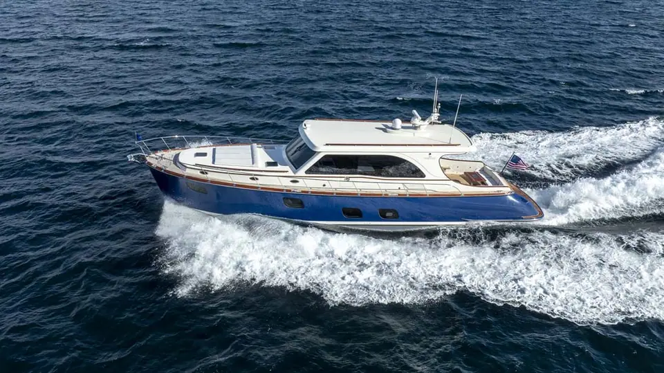Aerial view of the Vicem 65 Classic running at speed with a long white wake