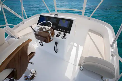 Viking 38 Billfish flybridge helm with teak pod, electronics and helm chair
