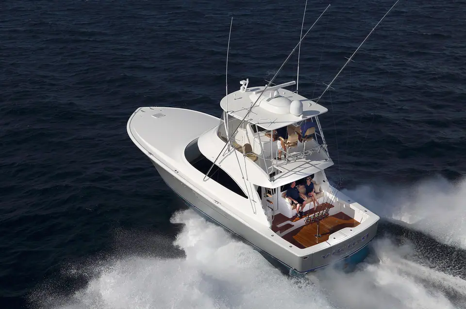 Viking 48 Convertible seen from astern and above at speed, showing the teak cockpit