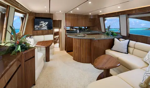 Viking 48 Convertible salon with walnut joinery, L shaped settee and galley forward