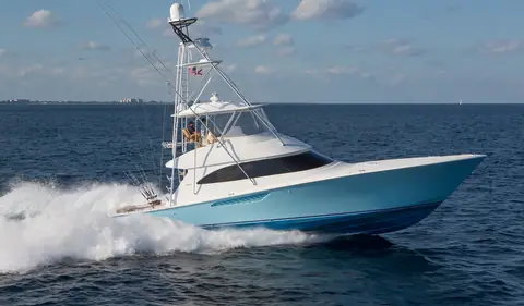 Viking 55 Convertible with a light blue hull and tuna tower running at speed in profile
