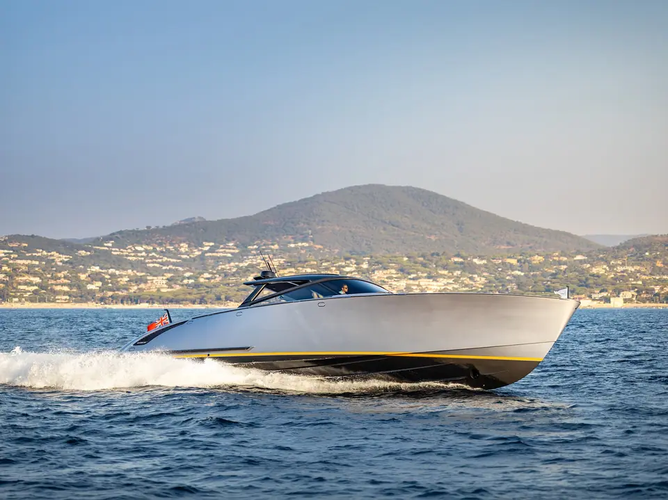Silver Wajer 55 HT with hardtop underway off the French Riviera hills