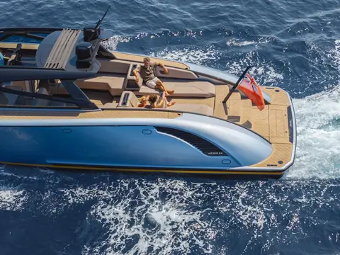 Wajer 55 HT aft deck lounge and teak swim platform seen from above while underway