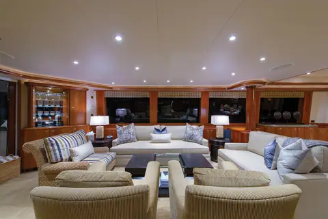 Westport 112 saloon with cream sofas and armchairs, cherry joinery and wide windows